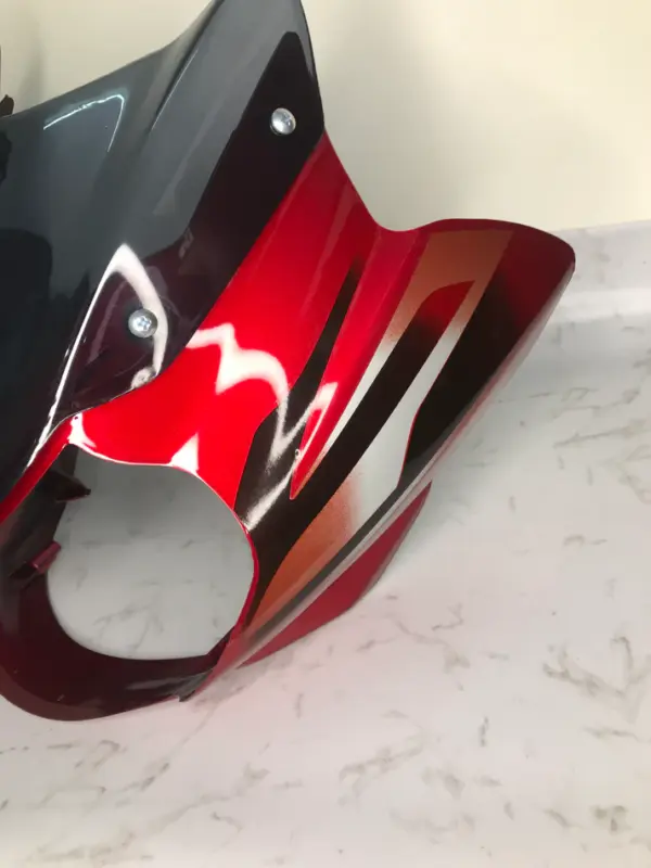 Headlight Visor For Bajaj Discover 135 Cc Digital Meter – Red Colour Sai