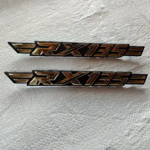 Side panel monogram rx135. Colour gold
