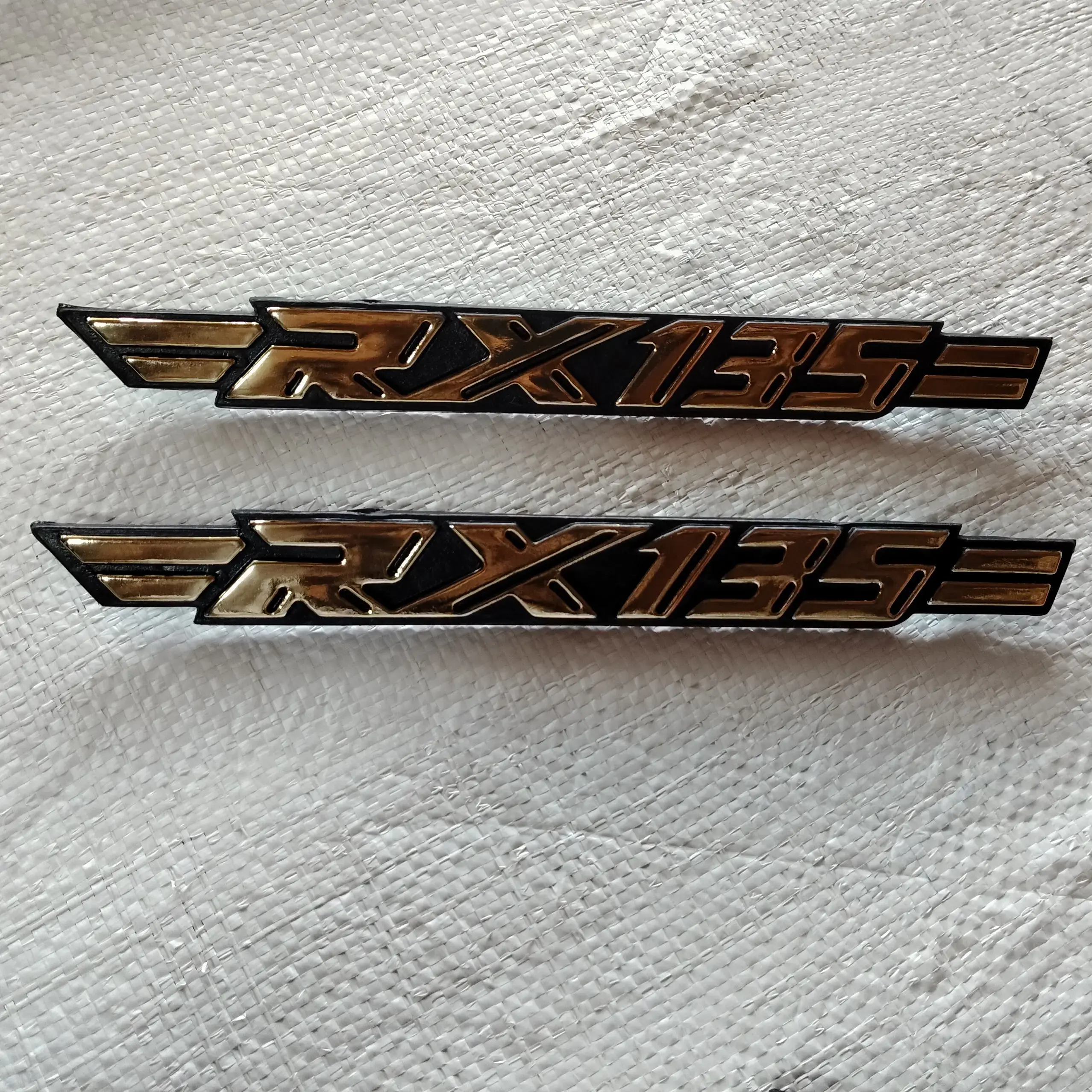 Side panel monogram rx135. Colour gold